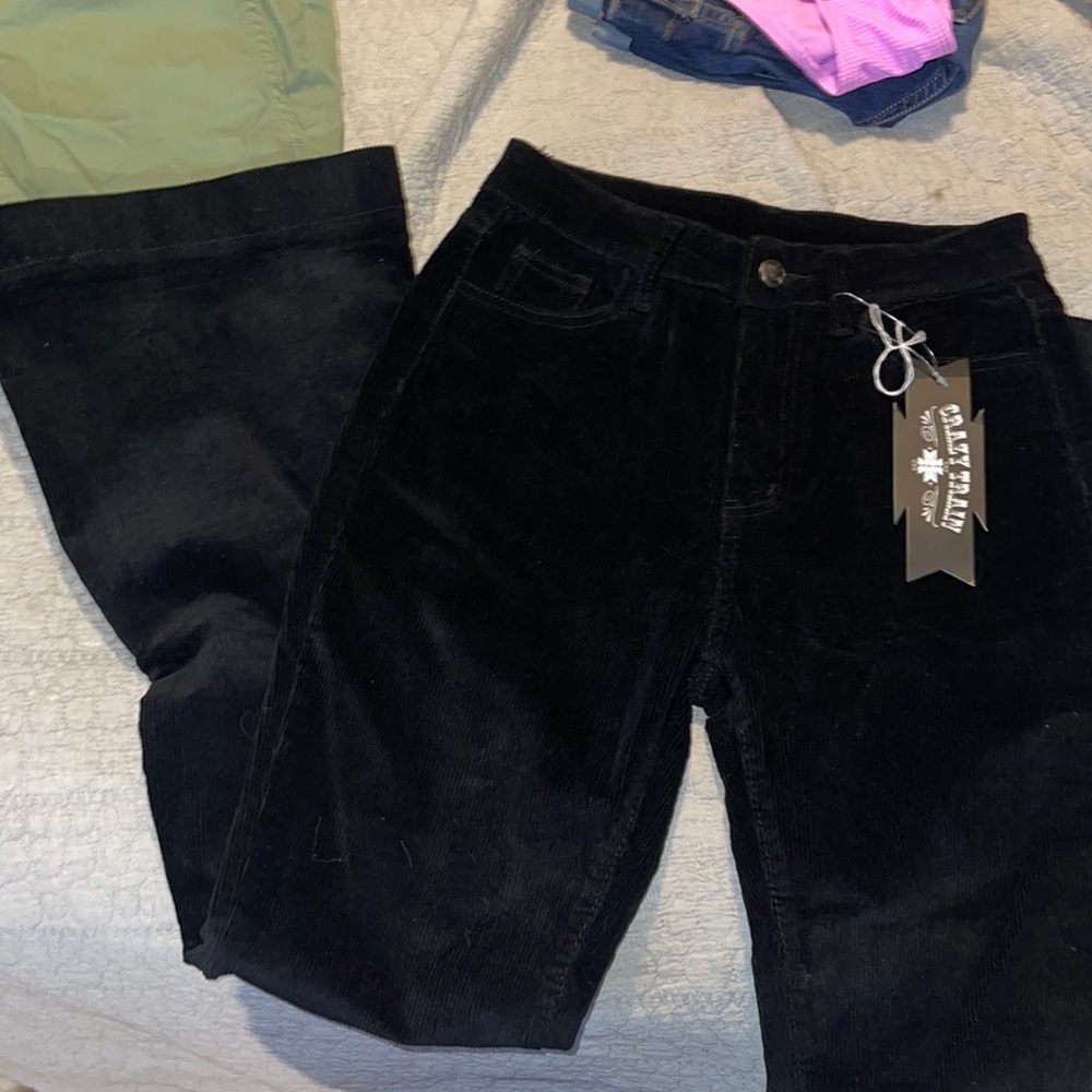 Boutique crazy train black with small bell bottoms RUNS A SIZE SMALLER